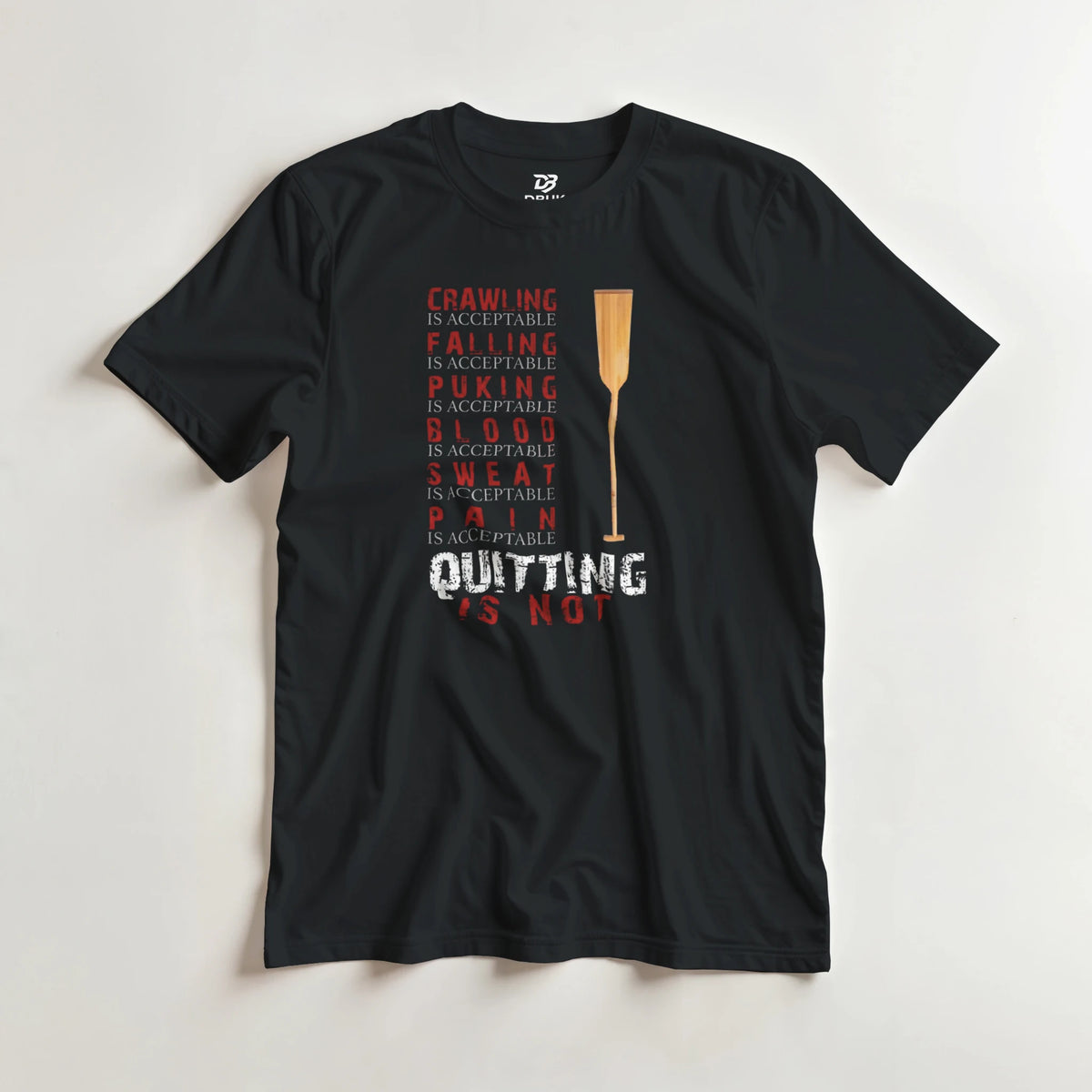 Black unisex graphic tee with central trophy and “Quitting is not” typography