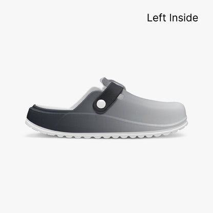 Grey clog side profile with single black strap and round logo detail