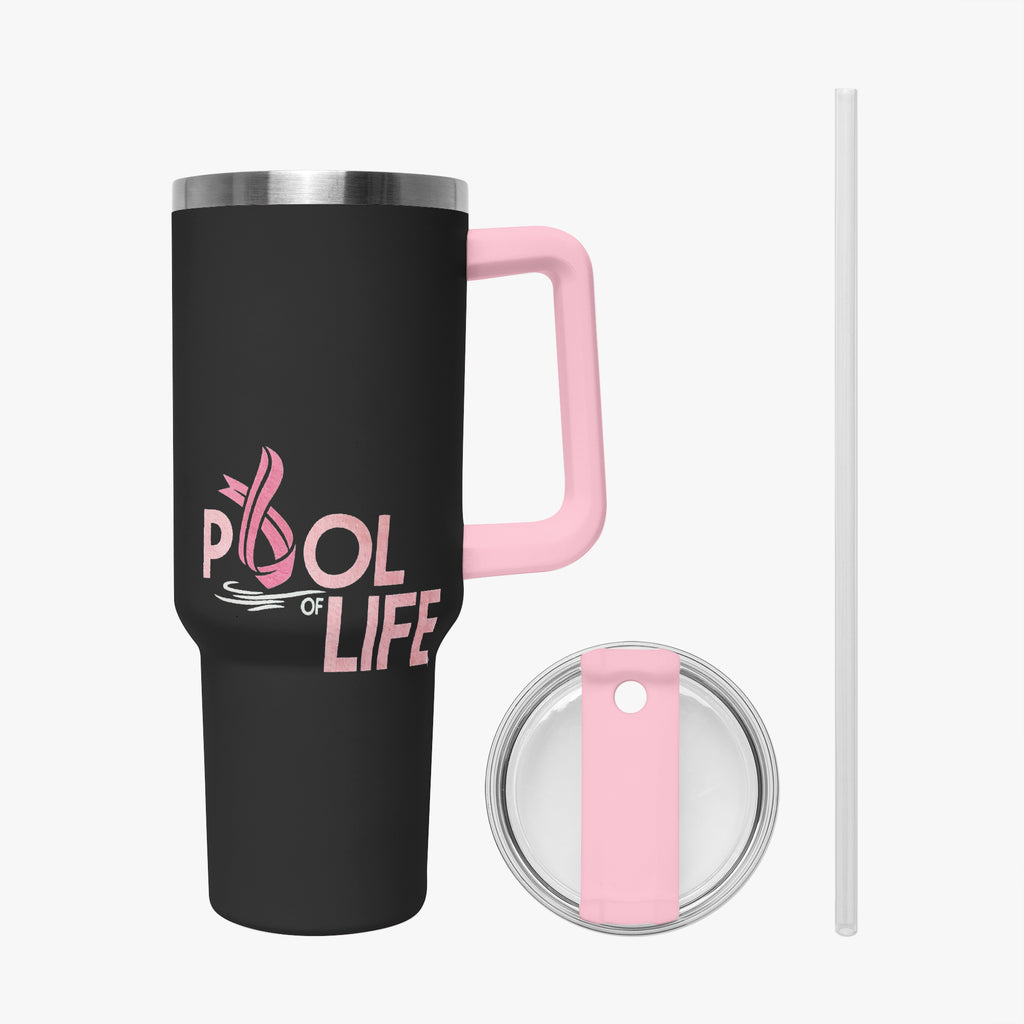 A black insulated travel tumbler with a pink handle and a pink lid, shown on a light gray background. The tumbler has a pink and white graphic that reads 'POOL OF LIFE' with a pink ribbon motif.