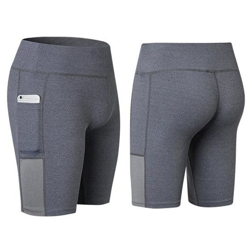 Gray stretch yoga shorts with phone pocket detail, mid-thigh length.