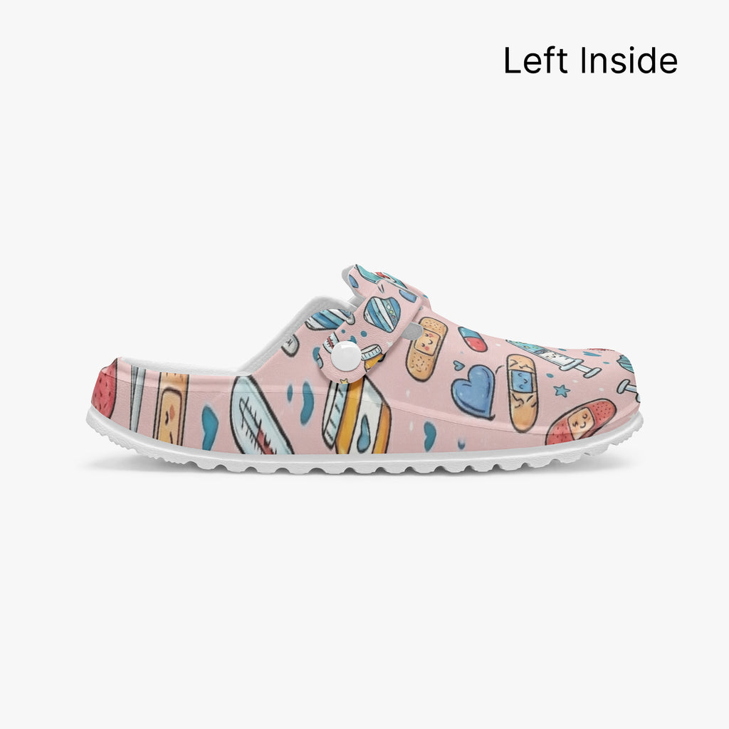 Pink medical doodle clog with adjustable strap and colorful cartoon print, side view