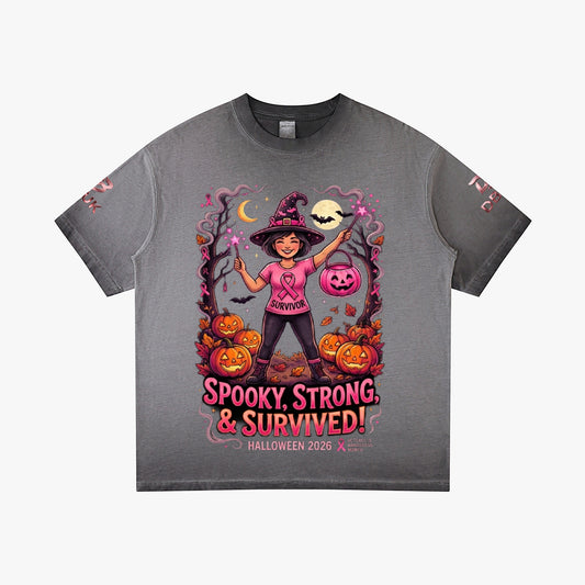 Dark gray Halloween graphic tee with witch, pumpkins, and “Spooky Strong & Survived!”