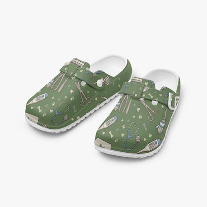 Pair of green veterinary print EVA clogs, slip-on design with white interior