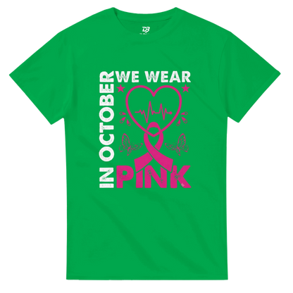 Green unisex crewneck T-shirt with 'We Wear Pink' heart graphic in white and pink