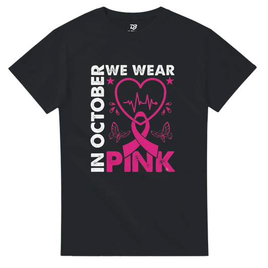 Black unisex T-shirt with 'OCTOBER WE WEAR PINK' heart ribbon graphic
