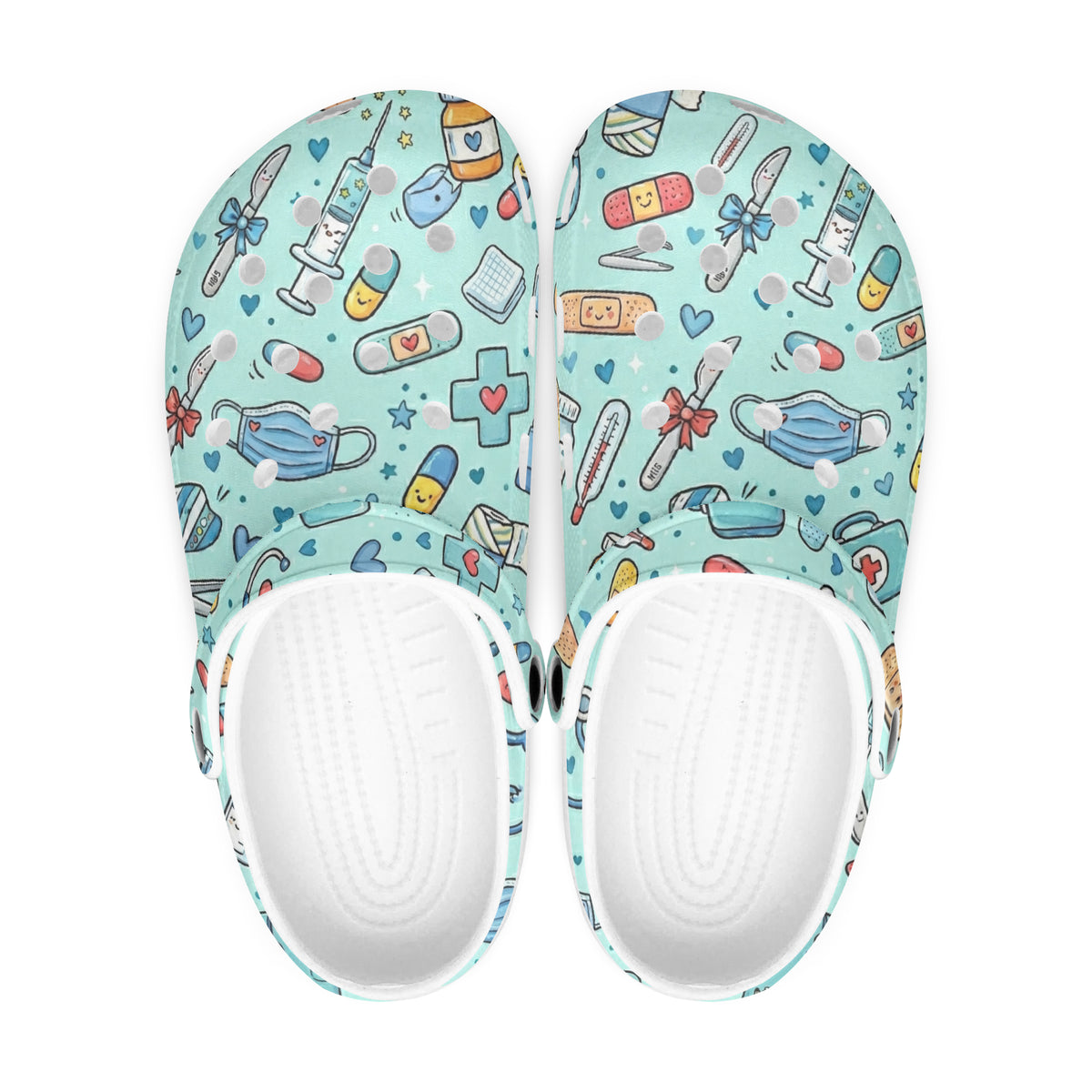 Pair of light blue clogs showing white inner sole with colorful cartoon medical print