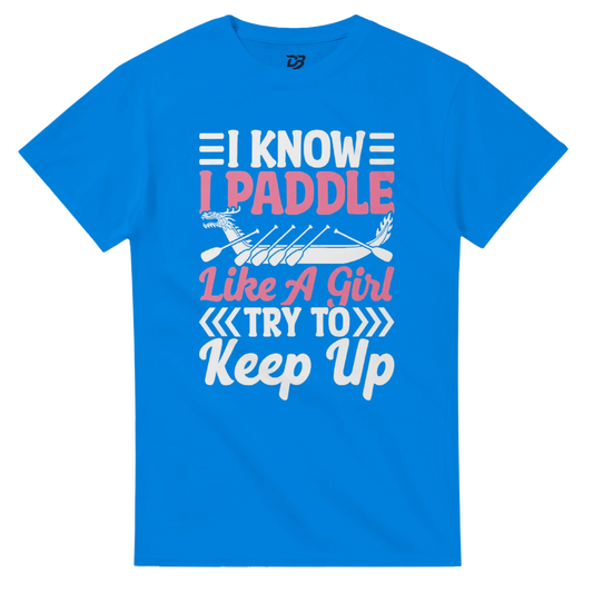 Blue women’s paddle graphic tee with “I Know I Paddle”, “Try To”, and “Keep Up” text.