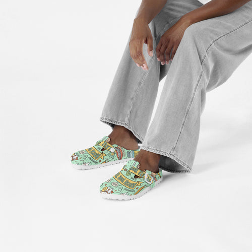 Mint printed EVA clogs worn with gray pants, front view of both shoes