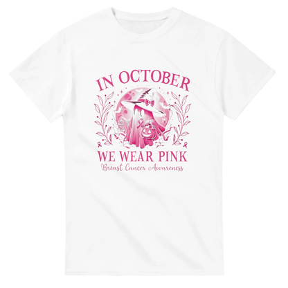 White unisex t-shirt with pink 'In October We Wear Pink' breast cancer graphic