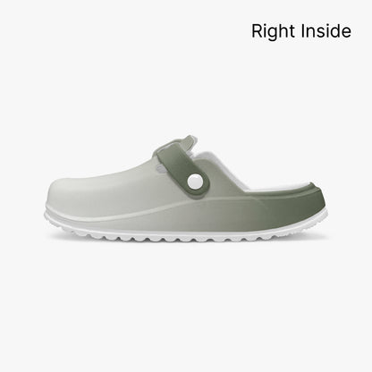 Single clog side view with round green strap feature and light gray footbed