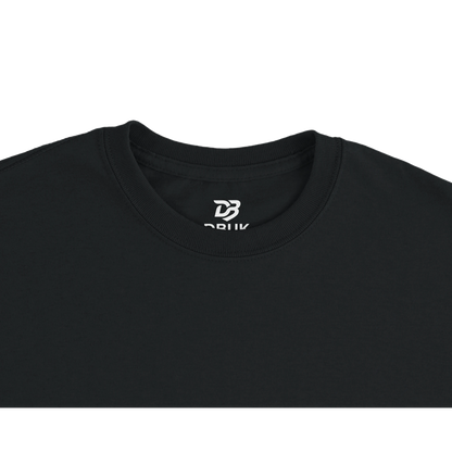 Black unisex tee close-up of crew neck with small chest logo
