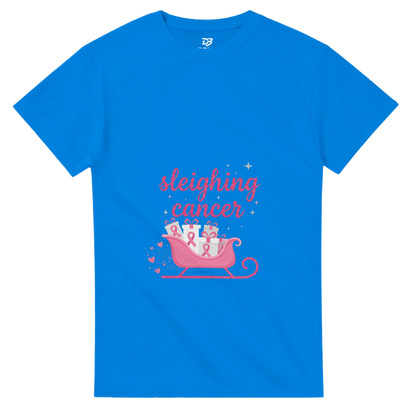 Royal blue cancer support T-shirt with pink “sleighing cancer” sleigh graphic