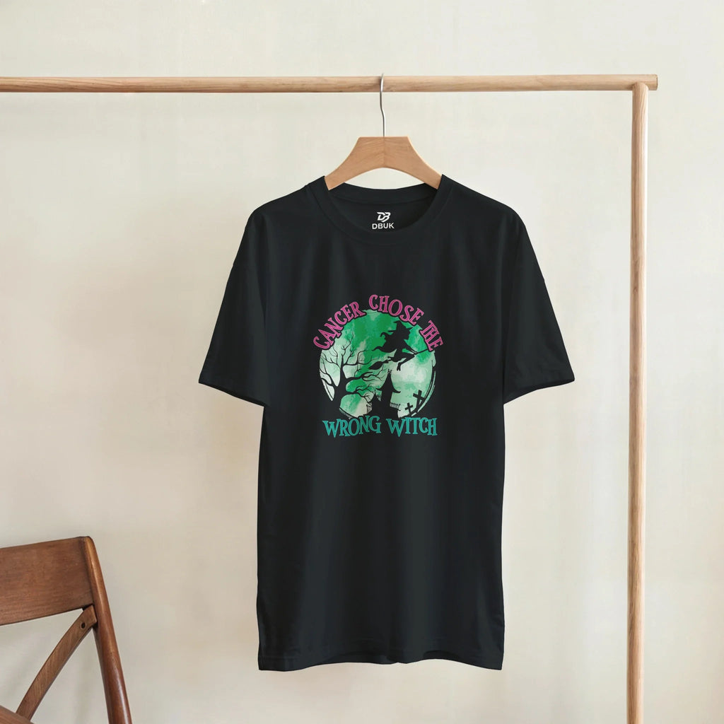 Black unisex T-shirt with green witch-themed graphic and chest slogan print