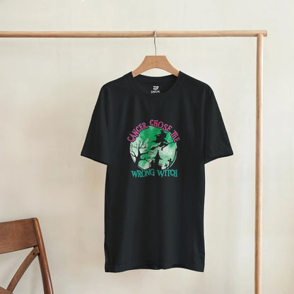 Black unisex T-shirt with green witch-themed graphic and chest slogan print