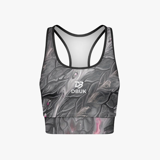 Women's cropped yoga tank top, dark grey marbled print, black racerback trim, DBUK logo