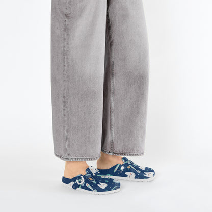 Right side dental print clog, blue EVA slip-on with dental-themed cartoon pattern.