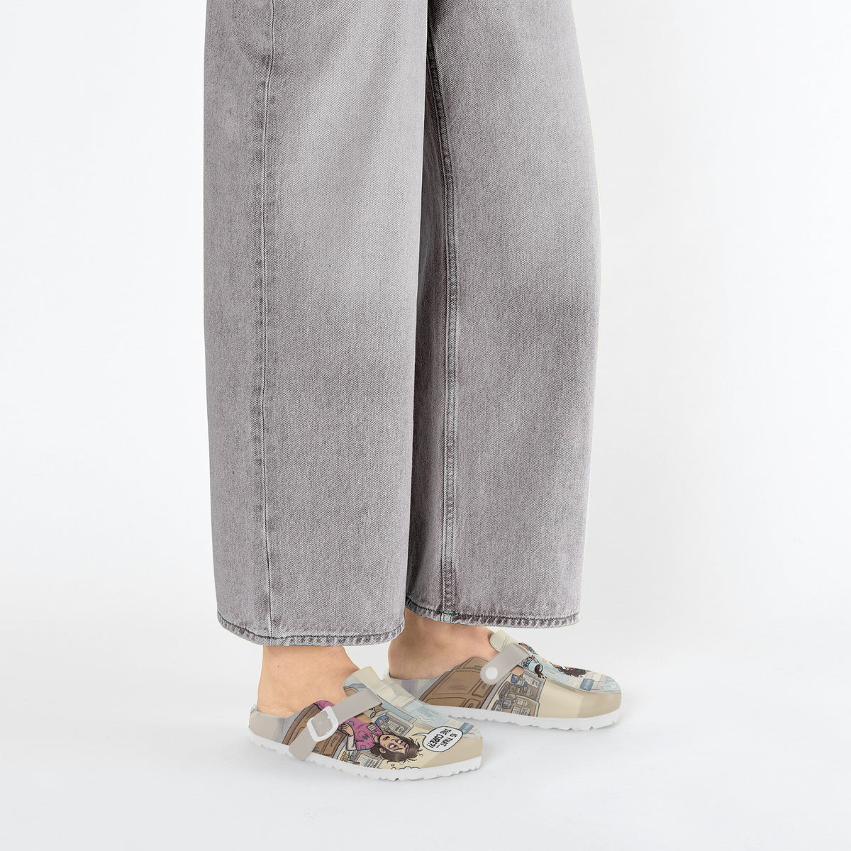 Lightweight EVA slip-on clogs with nurse comic print, beige strap and patterned upper