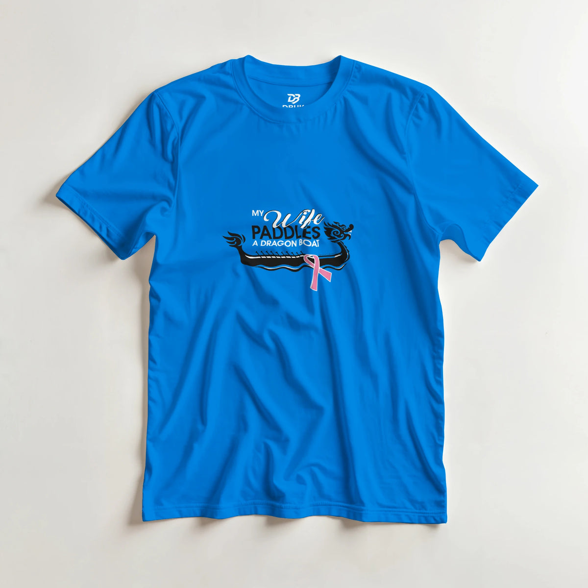 Royal blue unisex t-shirt with centered dragon boat graphic and pink ribbon