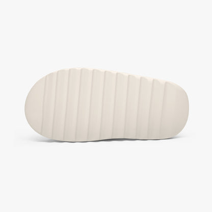 Light beige outsole for slide clogs with textured ribbed tread