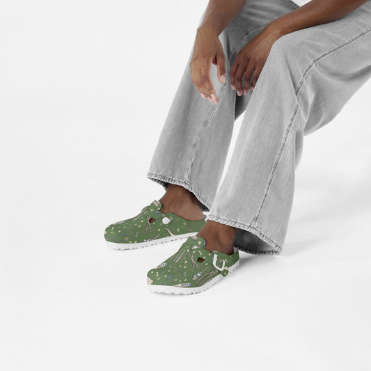Green veterinary print EVA clogs worn with white crew socks and jeans