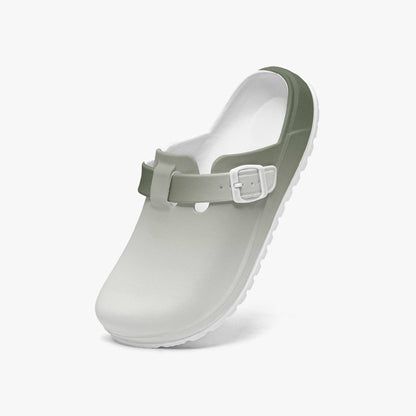 Light gray slip-on clog with dark green heel trim and hook-and-loop strap