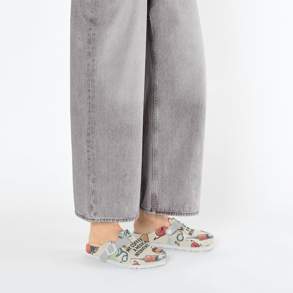 Nurse clogs shown from side with medical coffee print and light sole