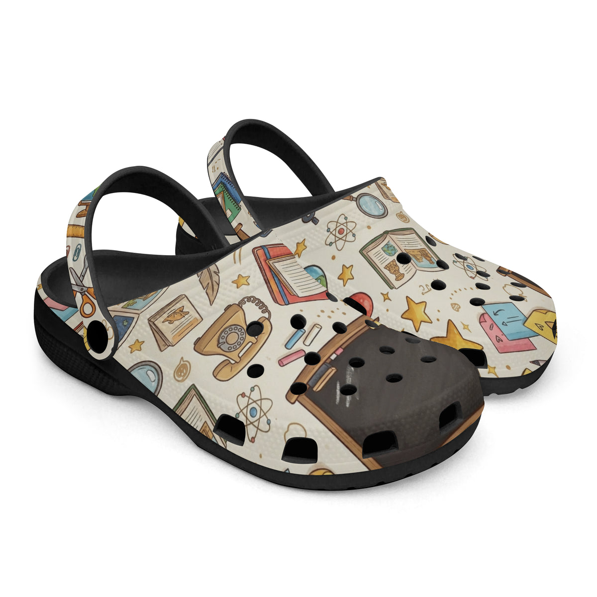 Pair of kids teacher clogs with classroom cartoon print uppers, open toe, and heel strap.