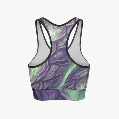 Women's cropped yoga tank top, back view with purple and green all-over print, black trim