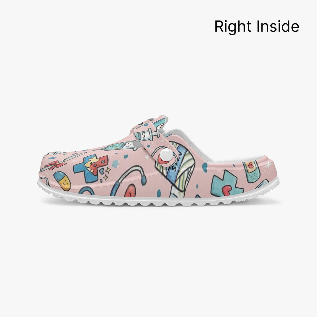 Pink medical doodle clog right inside view with open heel and white footbed