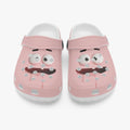 Pink kids clogs with cartoon animal face prints, front strap detail.