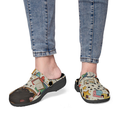 Kids teacher clogs on feet with colorful classroom pattern uppers and black base.