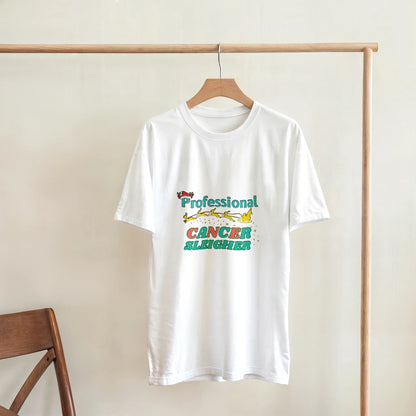 White crew neck T-shirt with colorful Cancer Sleigher graphic, on a wooden hanger