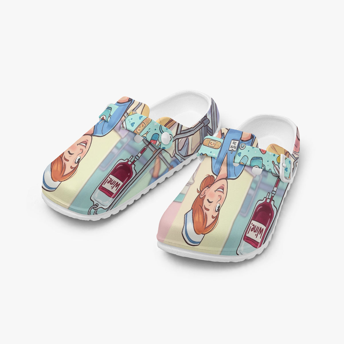 Nurse clogs in light blue and cream with colorful cartoon nursing print and strap.