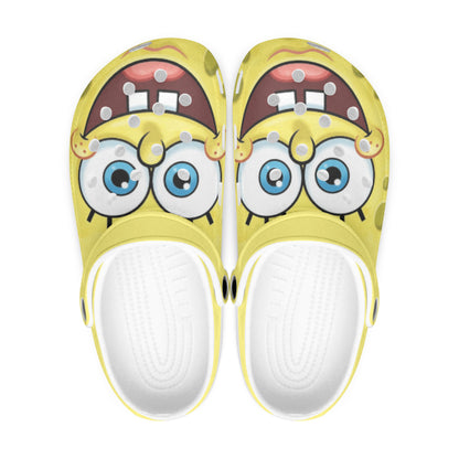 Pair of cartoon face clogs, yellow uppers with white lining and textured sole