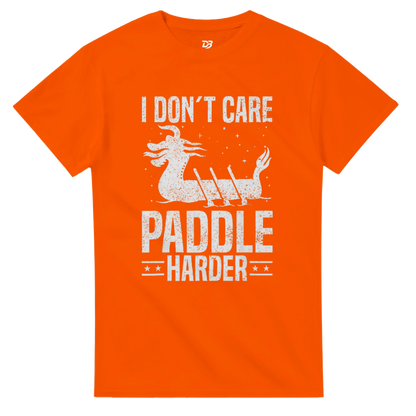 Orange unisex crewneck T-shirt with white "I DON'T CARE PADDLIE HARDER" dragon boat graphic